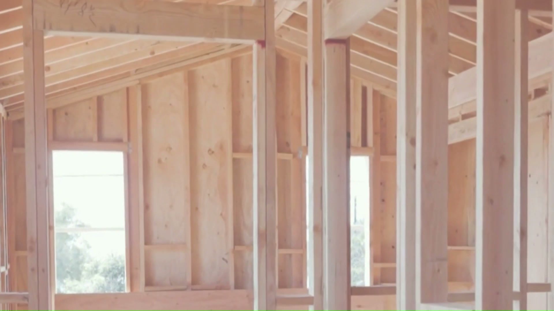 A fire rebuild framed by Addition Building and Design, the roof going on
